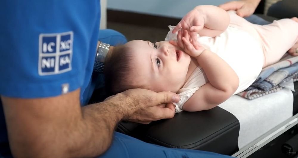 Chiropractor Dr. Theo Kousouli provides gentle chiropractic care to babies, toddlers, children, and families for spinal alignment and holistic wellness.