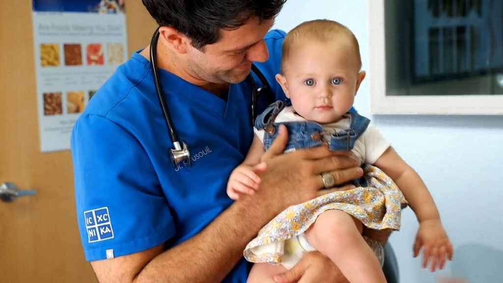 Gentle chiropractic baby adjustment for an infant to support spinal alignment and healthy development